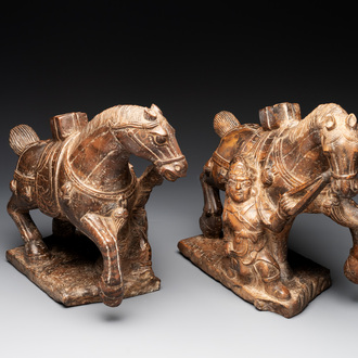 A pair of Chinese archaistic carved stone horses, 20th C.