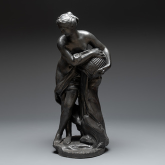 A lead sculpture of a lady pouring water, 19th C.