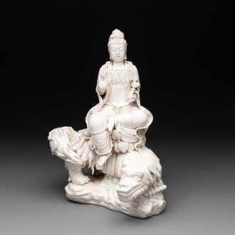 A Chinese Dehua blanc de Chine Bodhisattva seated on a Buddhist lion, 20th C.