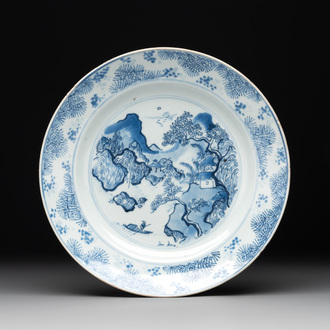 A Chinese blue and white 'Master of the Rocks' plate, Kangxi