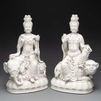 A pair of Chinese Dehua blanc de Chine Bodhisattvas seated on an elephant and a Buddhist lion, 20th C.