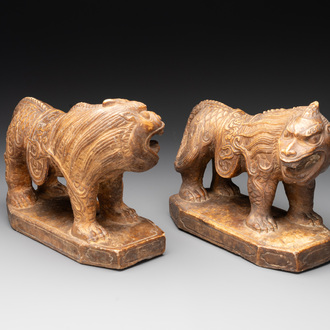 A pair of Chinese archaistic stone mythical beasts, 20th C.
