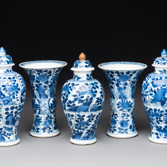 A Chinese blue and white garniture with five vases, Kangxi