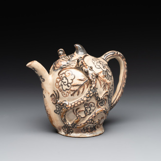 A Chinese Cizhou 'cadogan' ewer with dragons, Yuan/Ming
