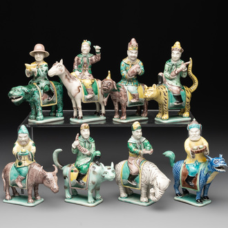 Eight Chinese verte biscuit figures riding mythical animals, 19/20th C.