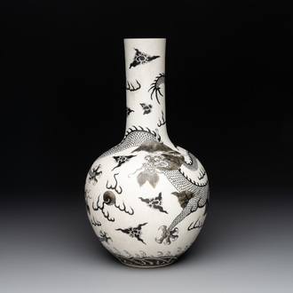 A Chinese black-enamelled  biscuit 'dragon' vase, Qianlong mark, 19th C.