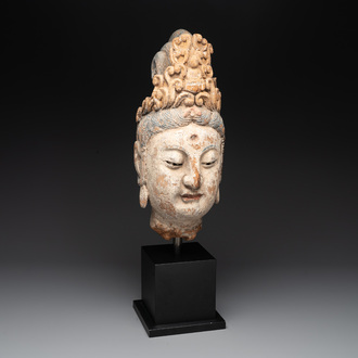 A large Chinese polychromed wooden head of Guanyin, probably Ming