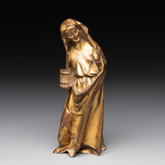 A gilt bronze figure of the Virgin of the Annunciation, probably 15th C.