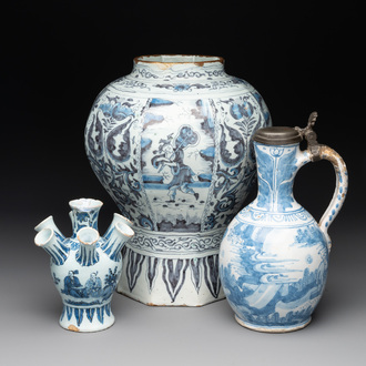 A blue and white Dutch Delft 'chinoiserie' tulip vase, a baluster vase and a pewter-mounted jug, 17th C.