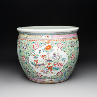 A Chinese famille rose lime-green-ground jardinière with birds, flowers and antiquities, 19th C.