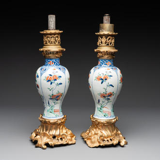 A pair of Chinese famille verte vases mounted as lamps, Kangxi