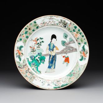 A Chinese famille verte 'lady and playing boy' plate, Kangxi