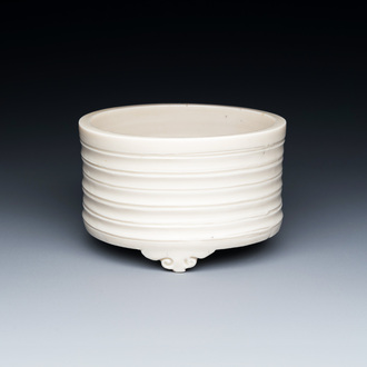 A Chinese Dehua blanc de Chine tripod censer, Kangxi