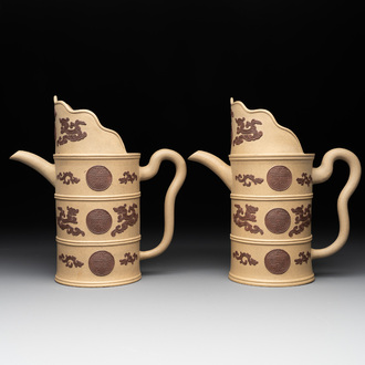 A pair of very rare Chinese Yixing stoneware 'duomuhu' ewers and covers, Kangxi