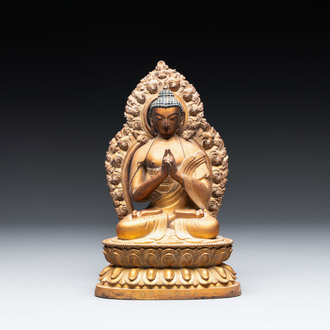 A fine Chinese gilt bronze Buddha, Qianlong mark and of the period