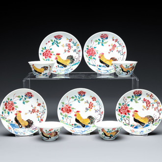 Four Chinese famille rose 'rooster' cups and five saucers, Yongzheng