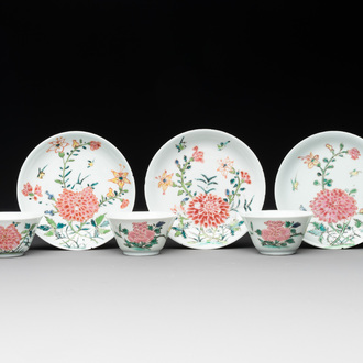 Three Chinese famille rose 'birds and flowers' cups and saucers, Yongzheng