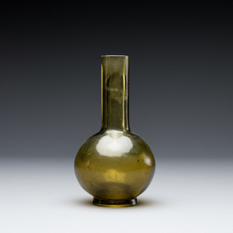 A rare Chinese translucent green Peking glass bottle vase, Qianlong mark and of the period