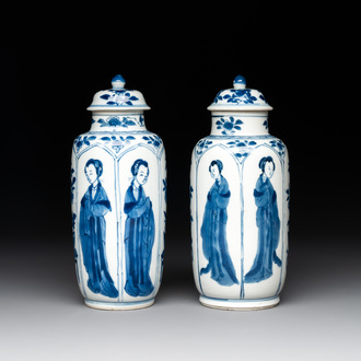 A pair of Chinese blue and white 'Long Eliza' vases and covers, jade mark, Kangxi
