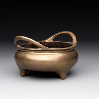 A Chinese bronze tripod censer with two handles, Xuande mark, 19th C.