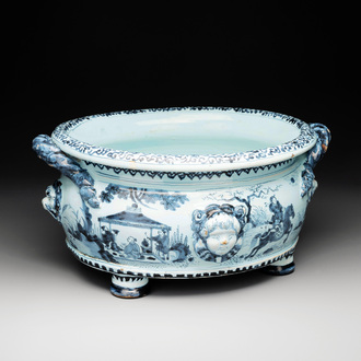 A blue and white Dutch Delft chinoiserie jardinière with mascarons, late 17th C.