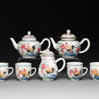 Two Chinese famille rose 'rooster' teapots, a milk jug and four handled cups, Yongzheng