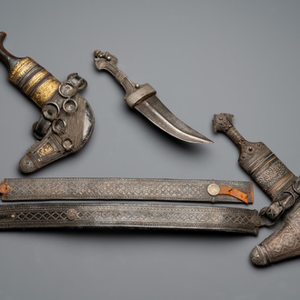 Three Omani Khanjars, one with Rhinoceros horn hilt, 19th C.