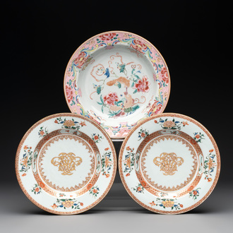 A pair of Chinese armorial monogrammed plates and a famille rose plate, Kangxi/Yongzheng