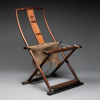 A Chinese huanghuali wooden folding chair, 17/18th C.