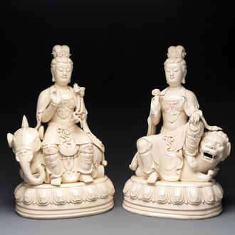 A pair of large Chinese Dehua blanc de Chine Bodhisattvas seated on an elephant and a Buddhist lion, 20th C.