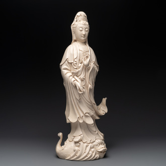 A large Chinese Dehua blanc de Chine Guanyin with a ruyi, 20th C.