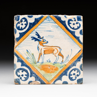A polychrome Dutch Delft maiolica 'stag' diamond tile, late 16th C.