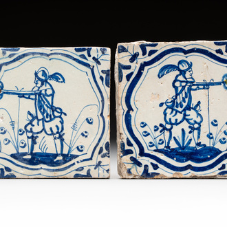 Two blue and white Dutch Delft 'soldier with coloured flame' tiles, 17th C.