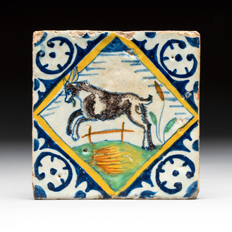 A polychrome Dutch Delft maiolica 'jumping goat' tile, late 16th C.