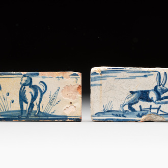 Two blue and white Dutch Delft 'dog' and 'rabbit' border tiles, late 16th C.