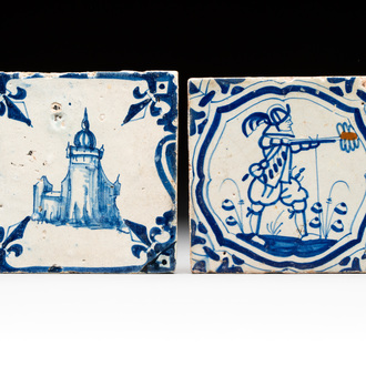 Two blue and white Dutch Delft 'castle' and 'soldier with coloured flame' tiles, 17th C.