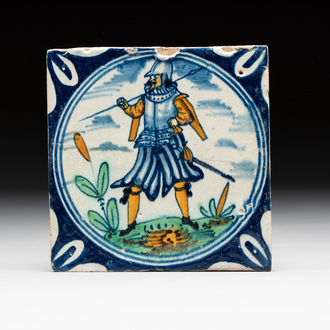 A polychrome Dutch Delft maiolica 'soldier' ​​medallion tile, late 16th C.