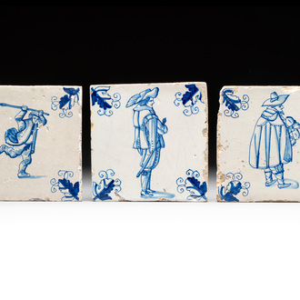 Three blue and white Dutch Delft tiles with oak leaf corners, 17th C.