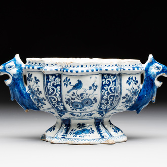 A rare blue and white Dutch Delft tulip vase base with dragon-form handles, 17/18th C.