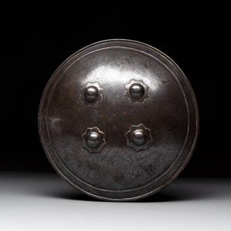 An Indo-Persian parcel-gilt and silver inlaid shield or dhal, 18/19th C.