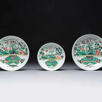 Two Chinese famille verte 'flower basket' dishes and a plate, Kangxi