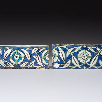 Two polychrome Damascus pottery border tiles with floral design, 17th C.