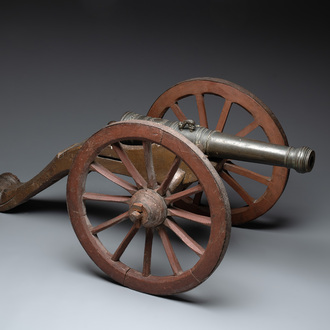 A Dutch bronze saluting cannon on a partly original carriage, inscribed C. Ouderogge Fecit, Rotterdam, dated 1641