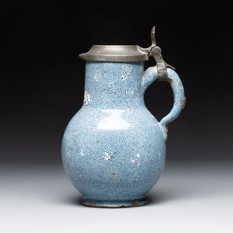 A monochrome blue Brussels faience pewter-mounted jug, 18th C.