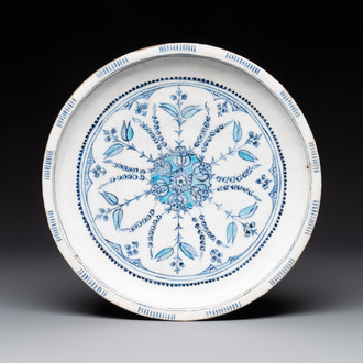 A blue, white and turquoise Iznik pottery dish with floral design, Turkey, late 16th C.