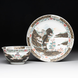 A Chinese famille rose and grisaille 'mountainous landscape' cup and saucer, Yongzheng