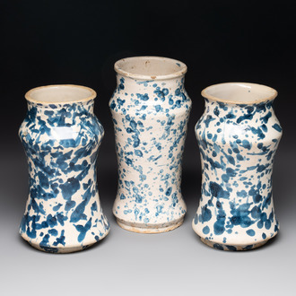 Three blue and white splash-glazed albarelli, Spain, 17th C.
