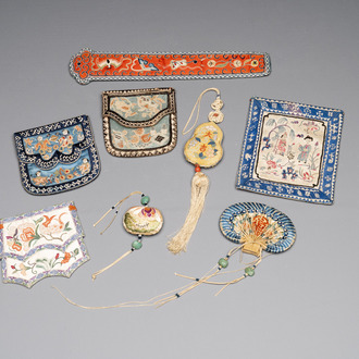 Eight Chinese embroidered silk pouches, 19th C.