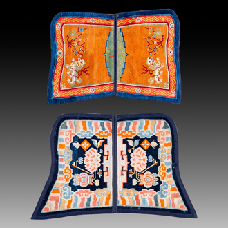 Two Tibetan saddle rugs with Buddhist lions and antiquities, 19th C.