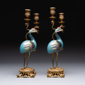 A pair of Chinese cloisonné cranes, later mounted as candelabras, 18th C.